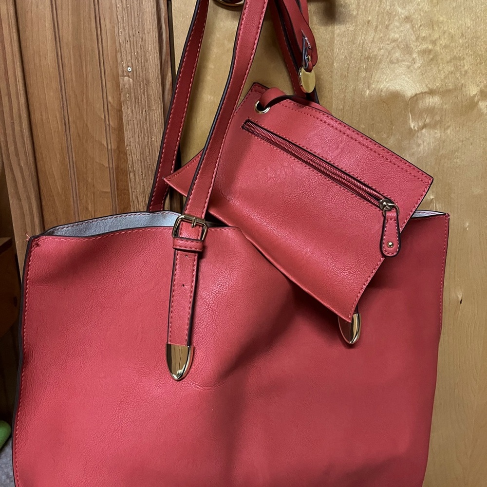 Women’s bag with attached smaller bag and key chain, color tangerine